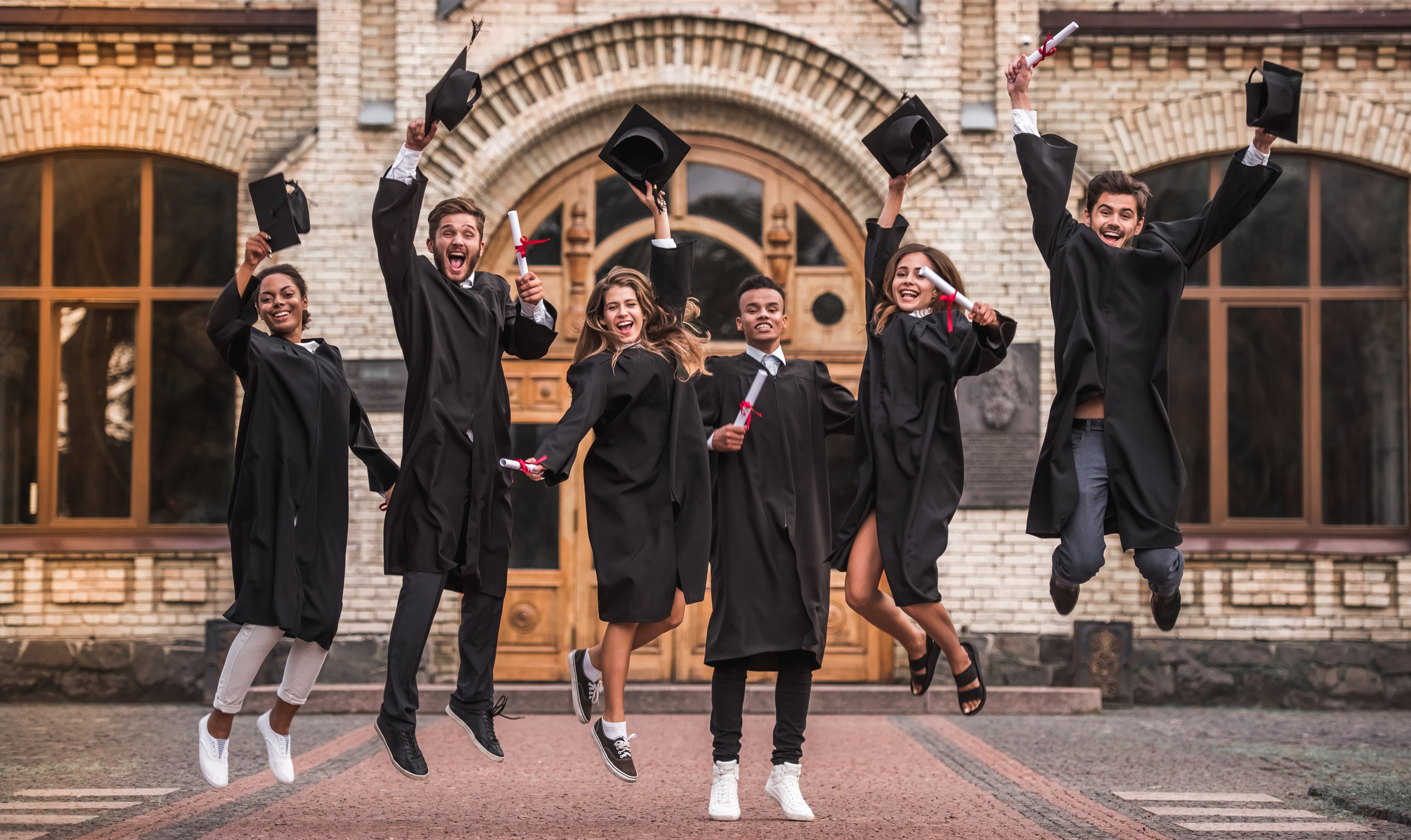 Happy young alumni